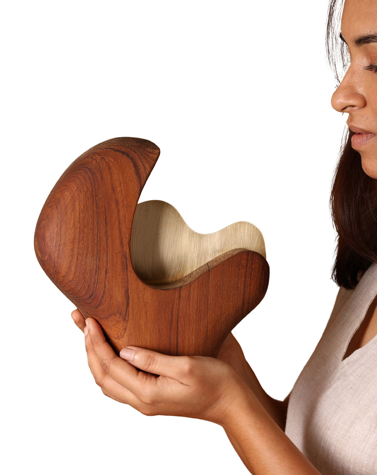 Solid teak body in warm brown, hand-carved and finished by makers in India