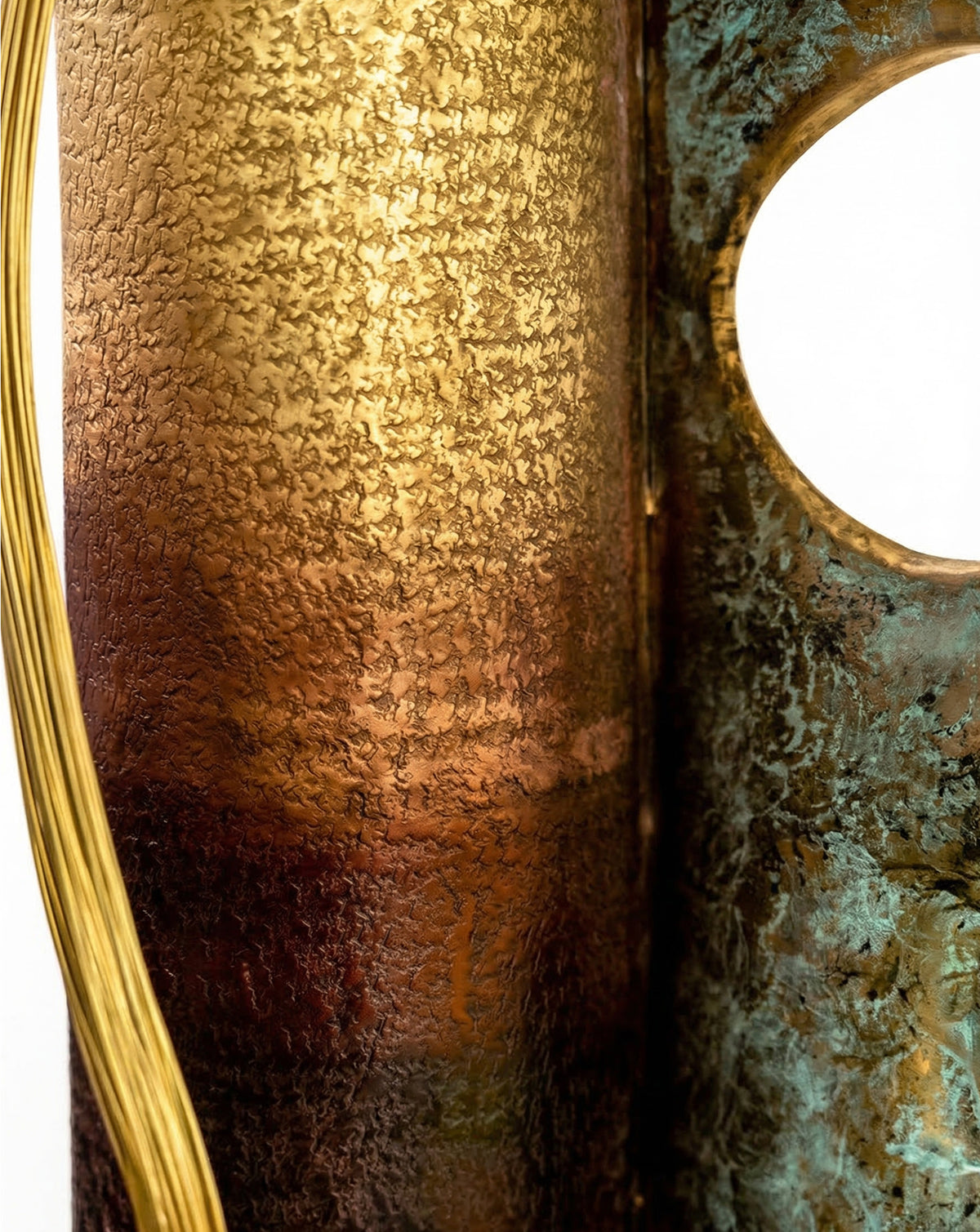 Detail of repetitive hammered texture marking the slow labour of handwork in India