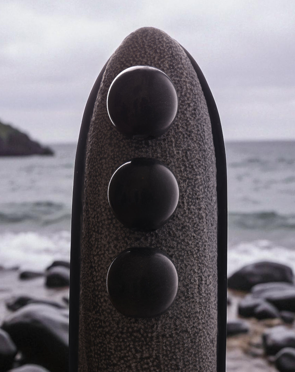 Sculptural marble column with a 38 cm wide base, presented at full height
