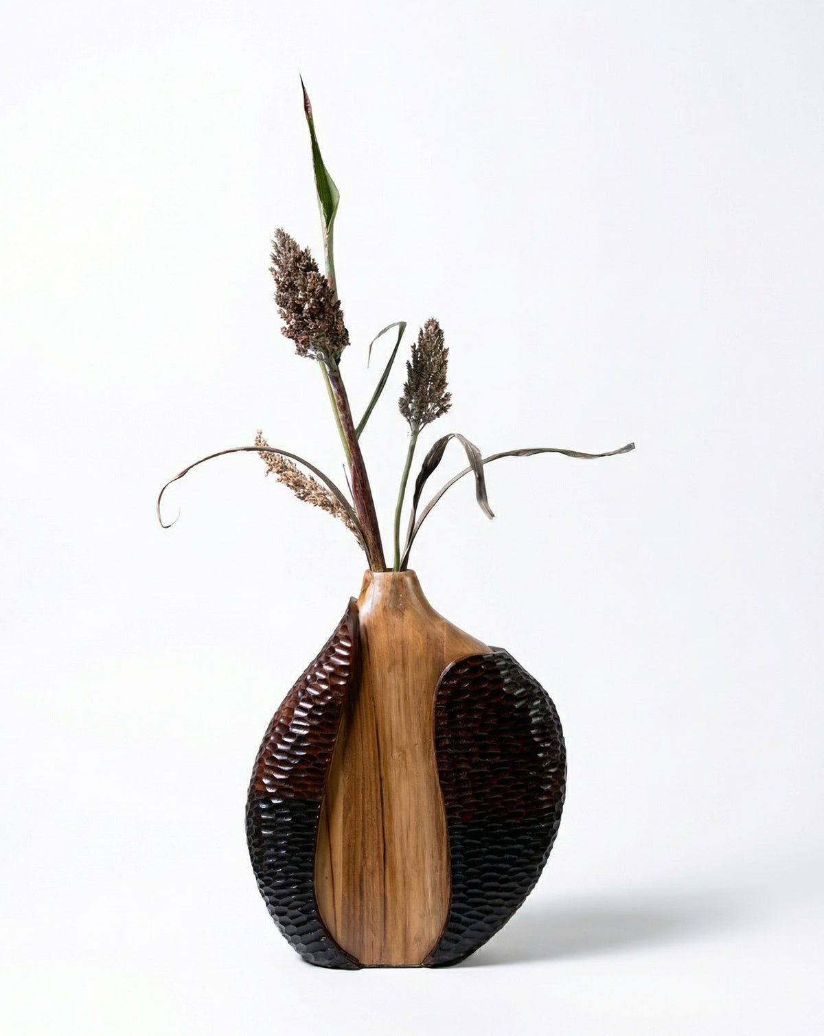 Warm natural wood tones and grain markings unique to each carved piece