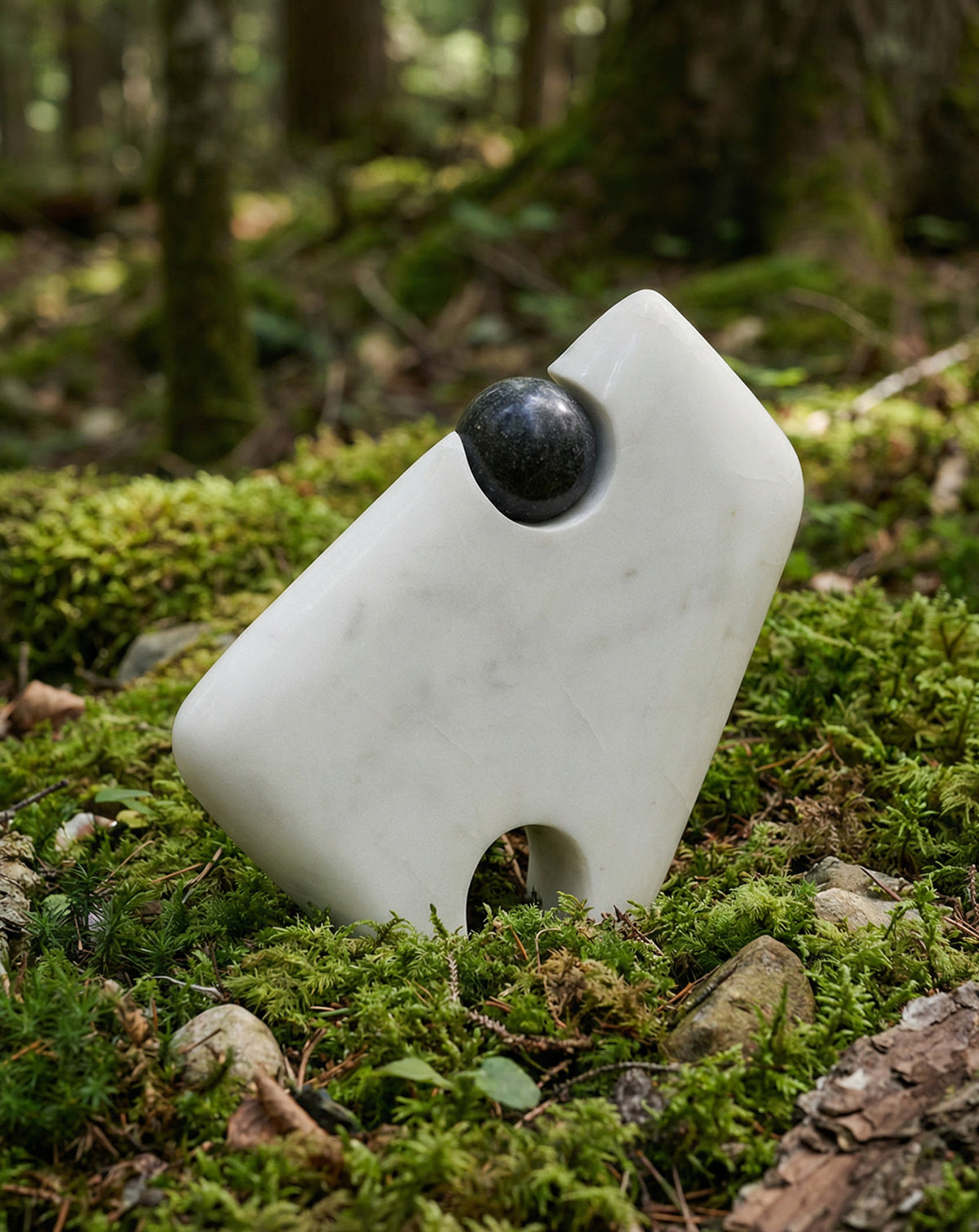 Two-tone marble form as a quiet statement piece for bedroom or kitchen surfaces