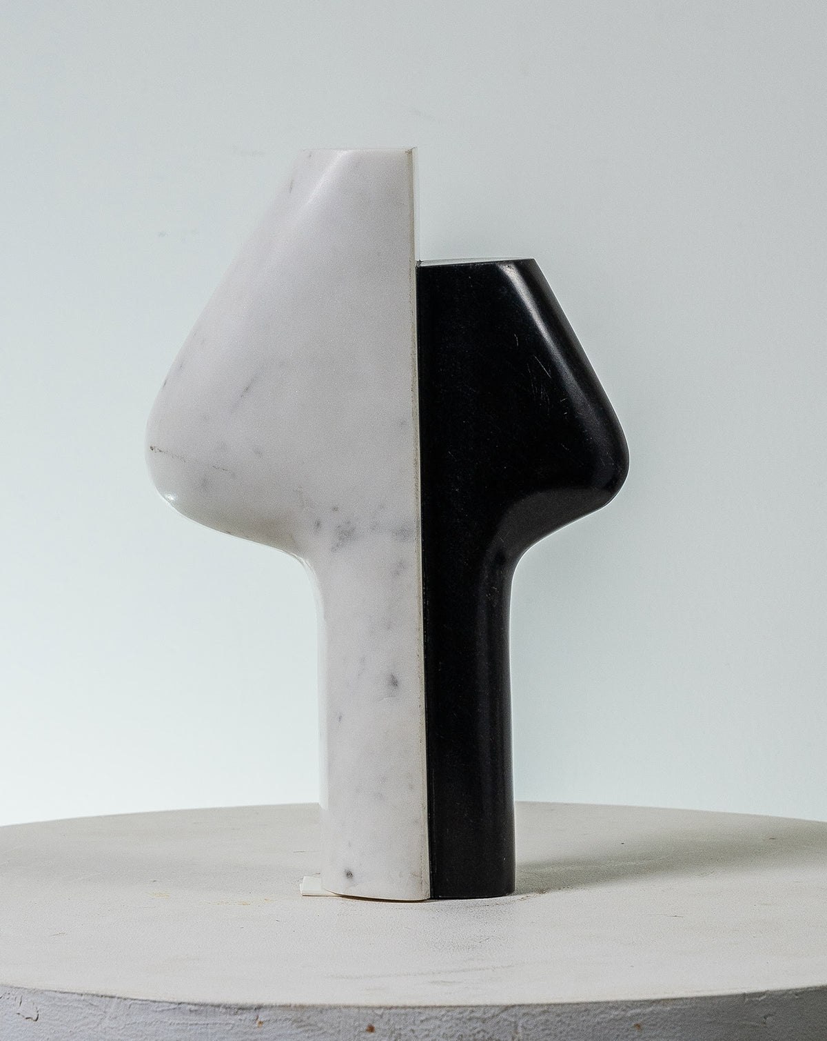 Contrasting black and white marble sections meeting in a clean sculptural join
