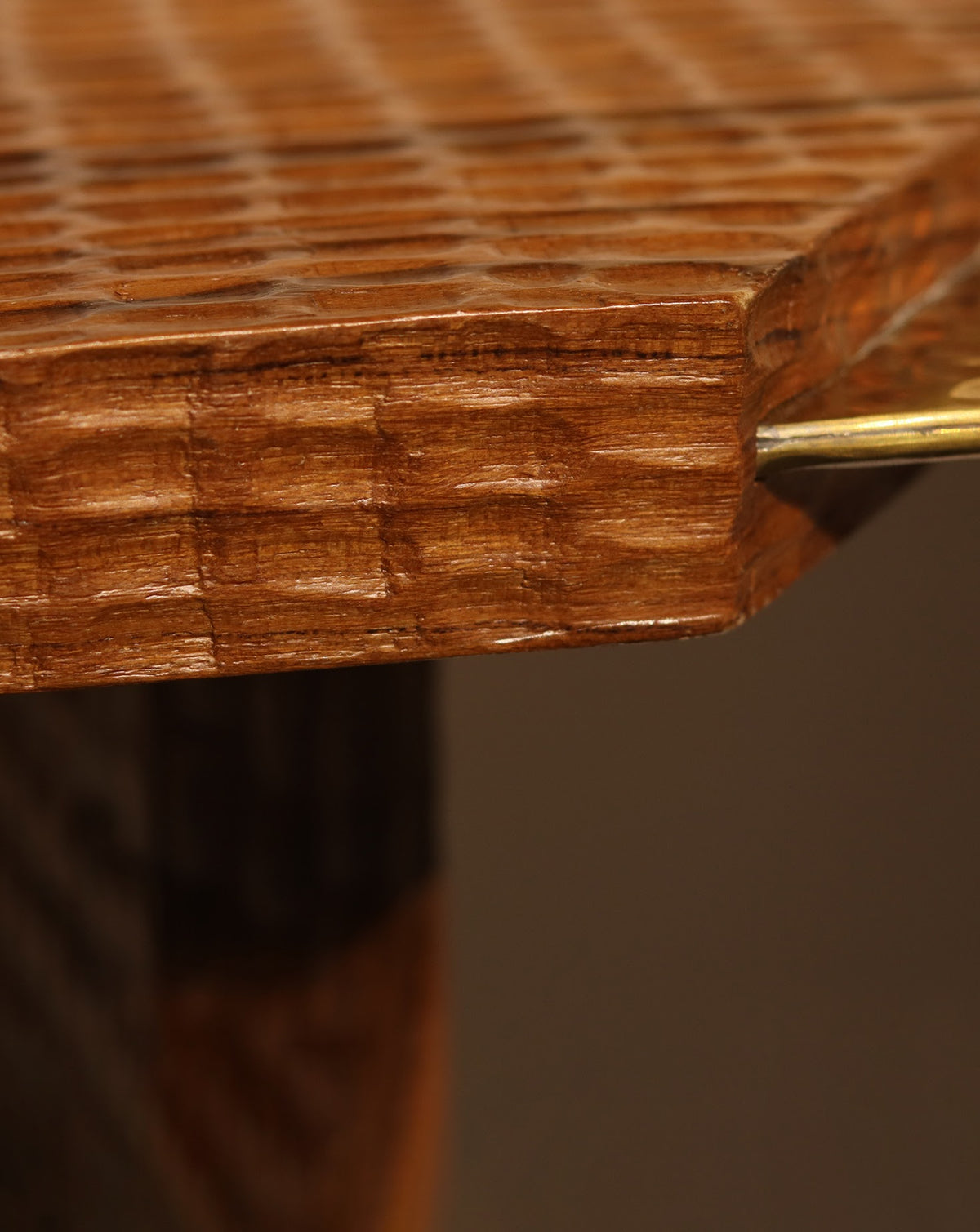 Intricate hand-carved pattern worked across the console by artisans in Vadodara, India