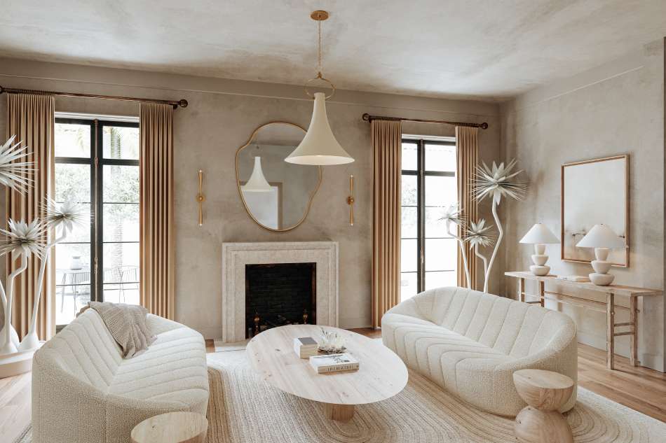 Modern living room with white furniture and neutral decor