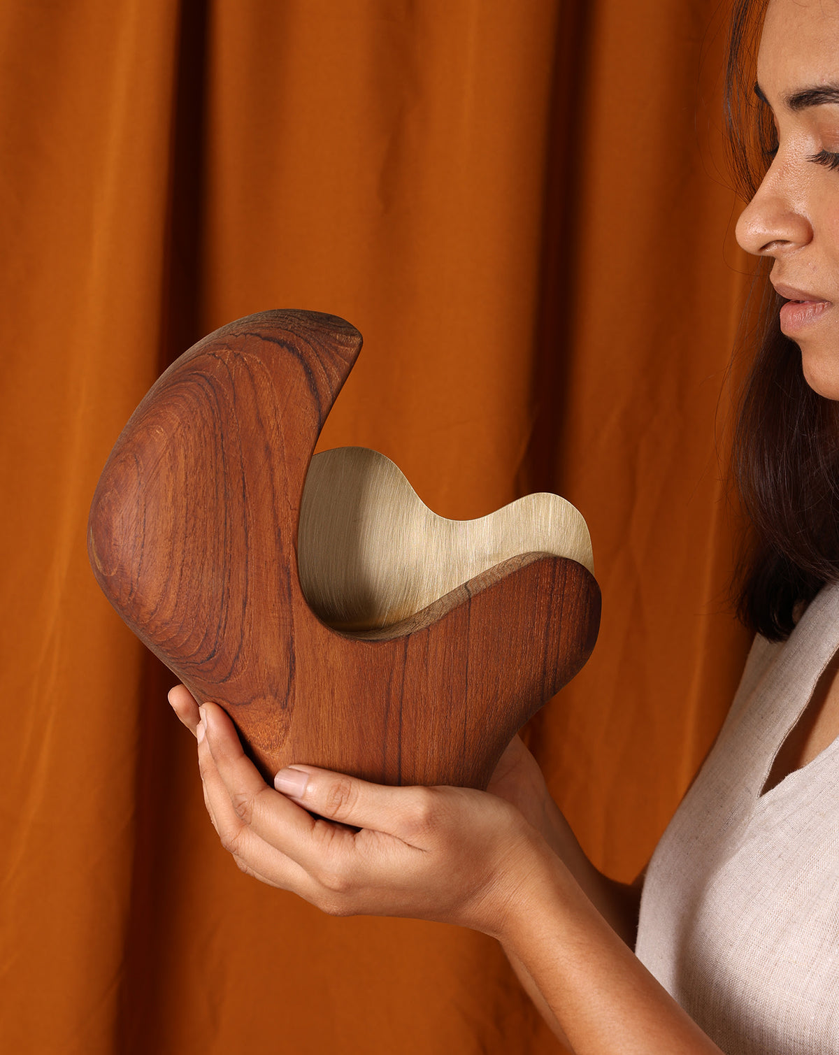 Detail of natural teak grain, with variation inherent to handcrafted materials