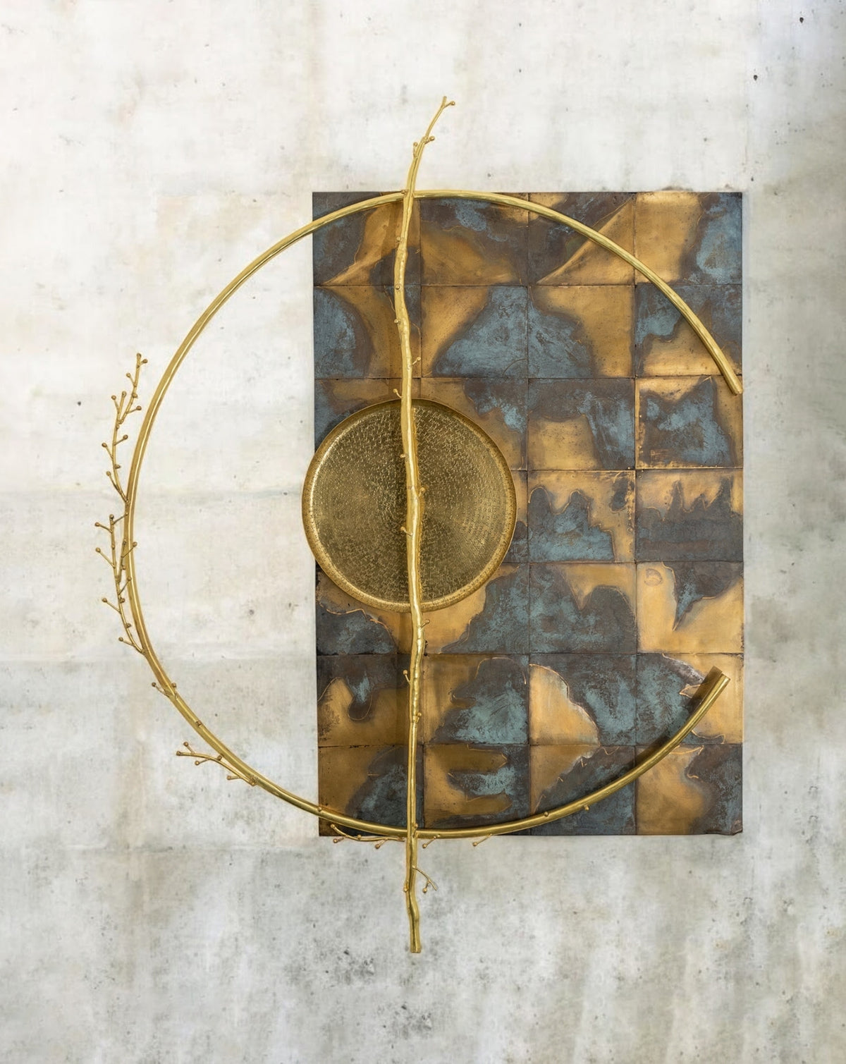 Circular brass composition reflecting the circle of life through aged and polished surfaces