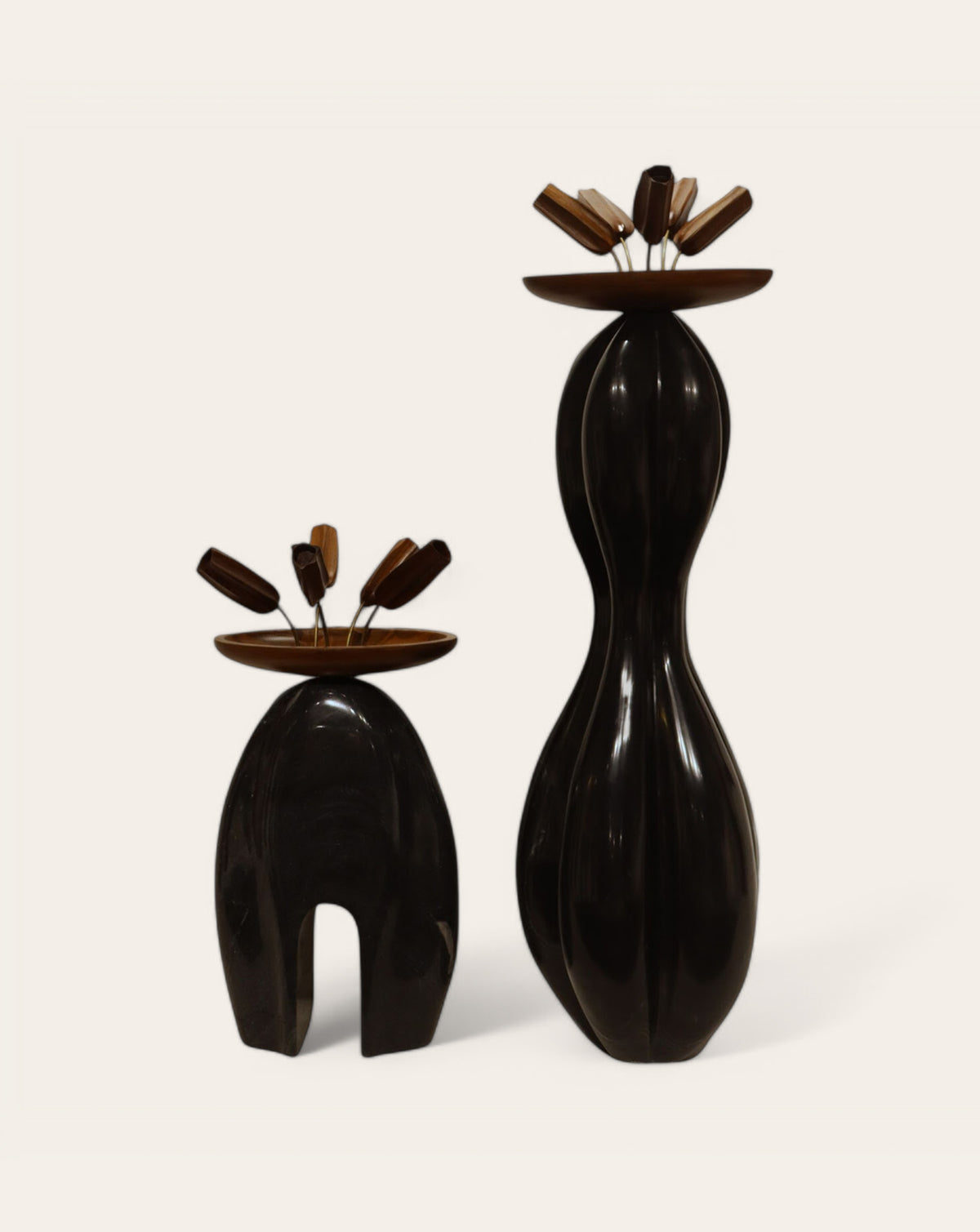 Solid black marble lamp base with forest-inspired animal and human figures