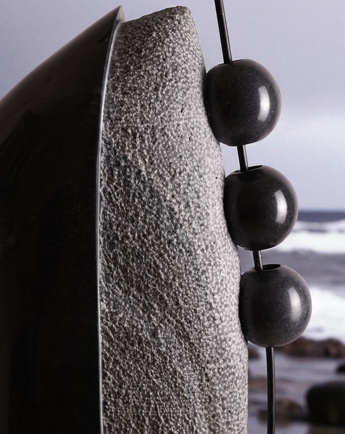 Monumental marble floor sculpture standing 113 cm tall as a room focal point