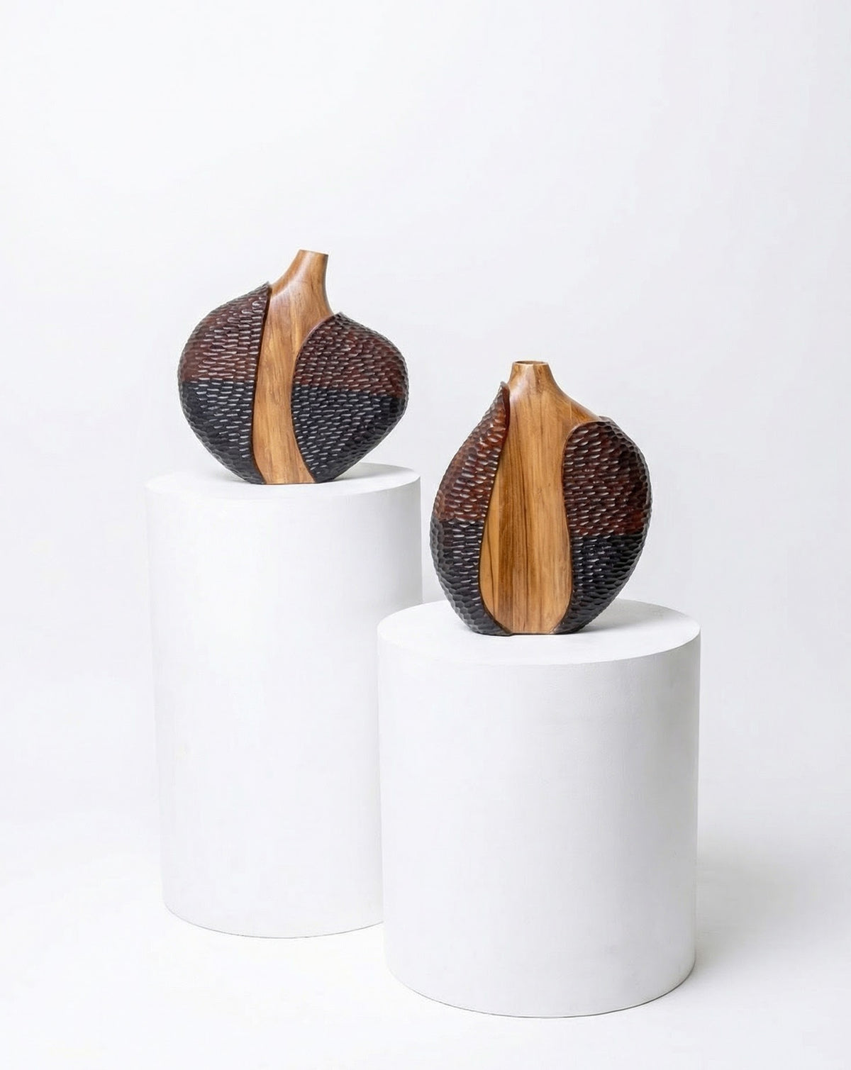 Brass-lined carved opening providing subtle contrast within the flowing wooden form