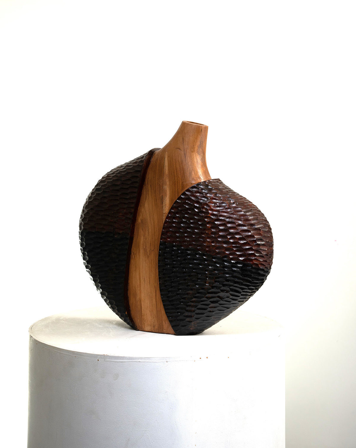 Gourd-shaped vase hand-carved in India, blending traditional craft with contemporary design