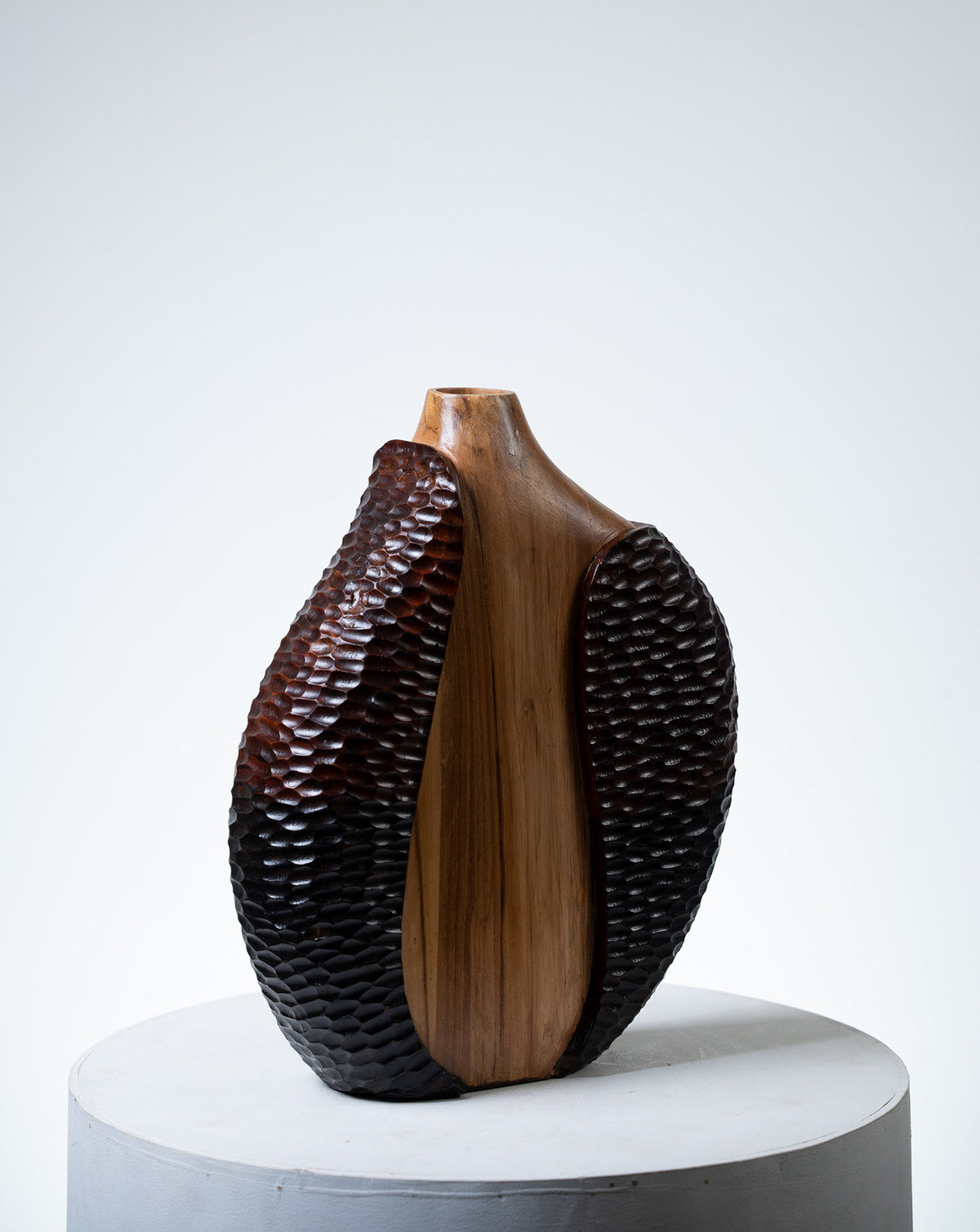 Handcrafted teak object for collectors who value provenance and maker-led design