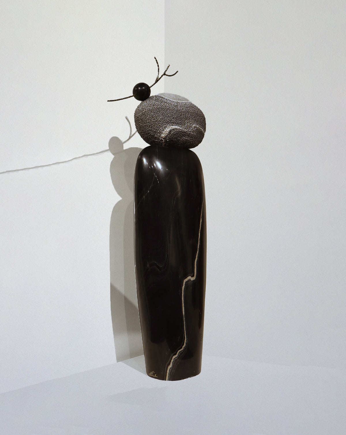 Floor-standing sculptural piece scaled for a living room or entrance hallway