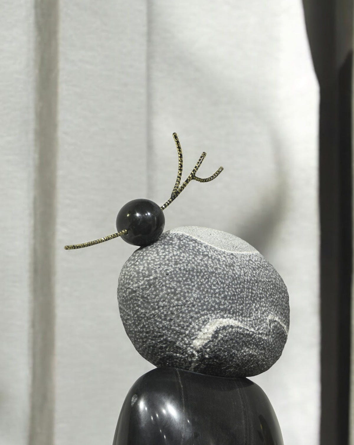 Quiet sculptural presence evoking strength, growth and connection to nature