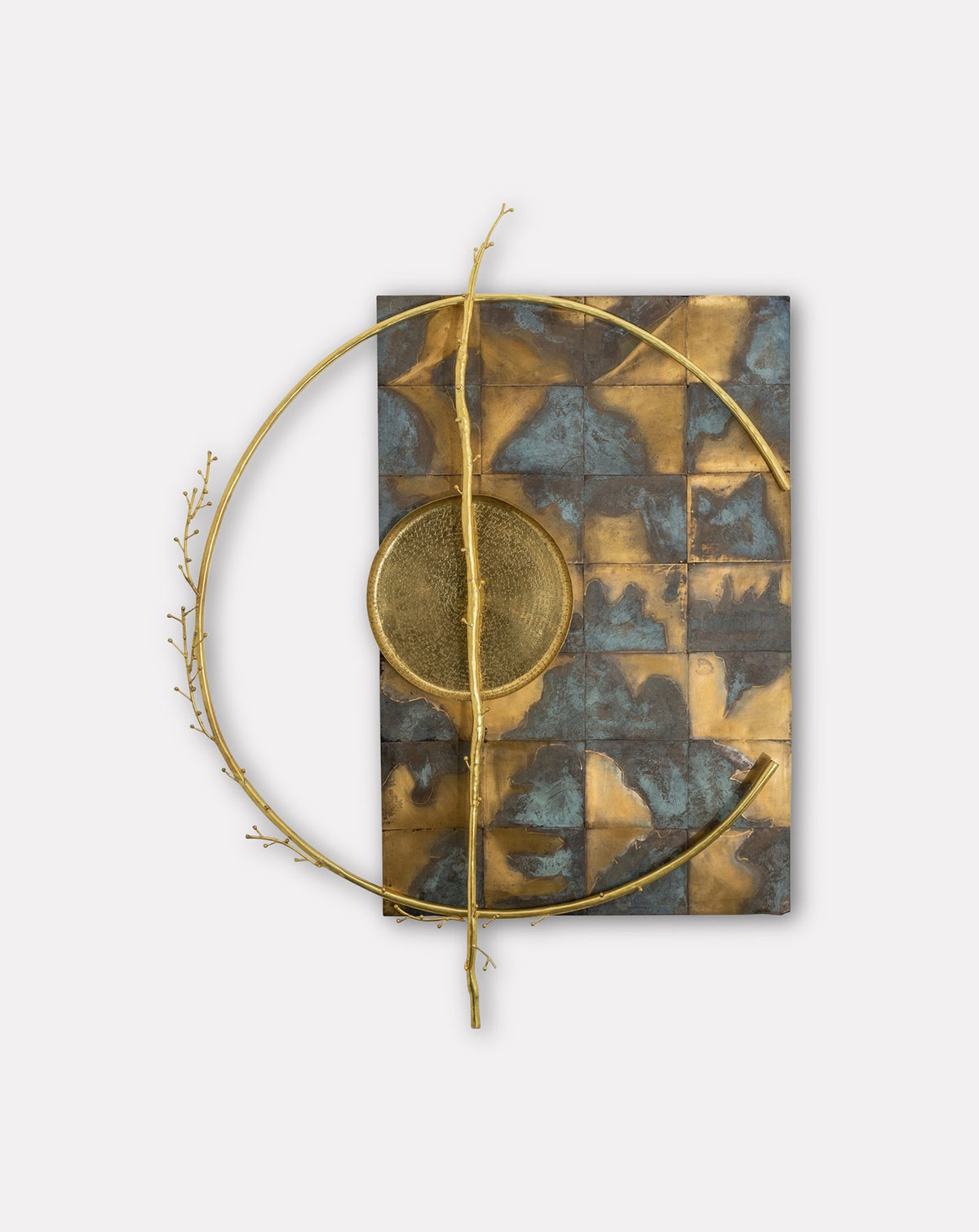 ANANT handmade brass wall art with circular frame, at home above luxury kitchenware or a dining sideboard