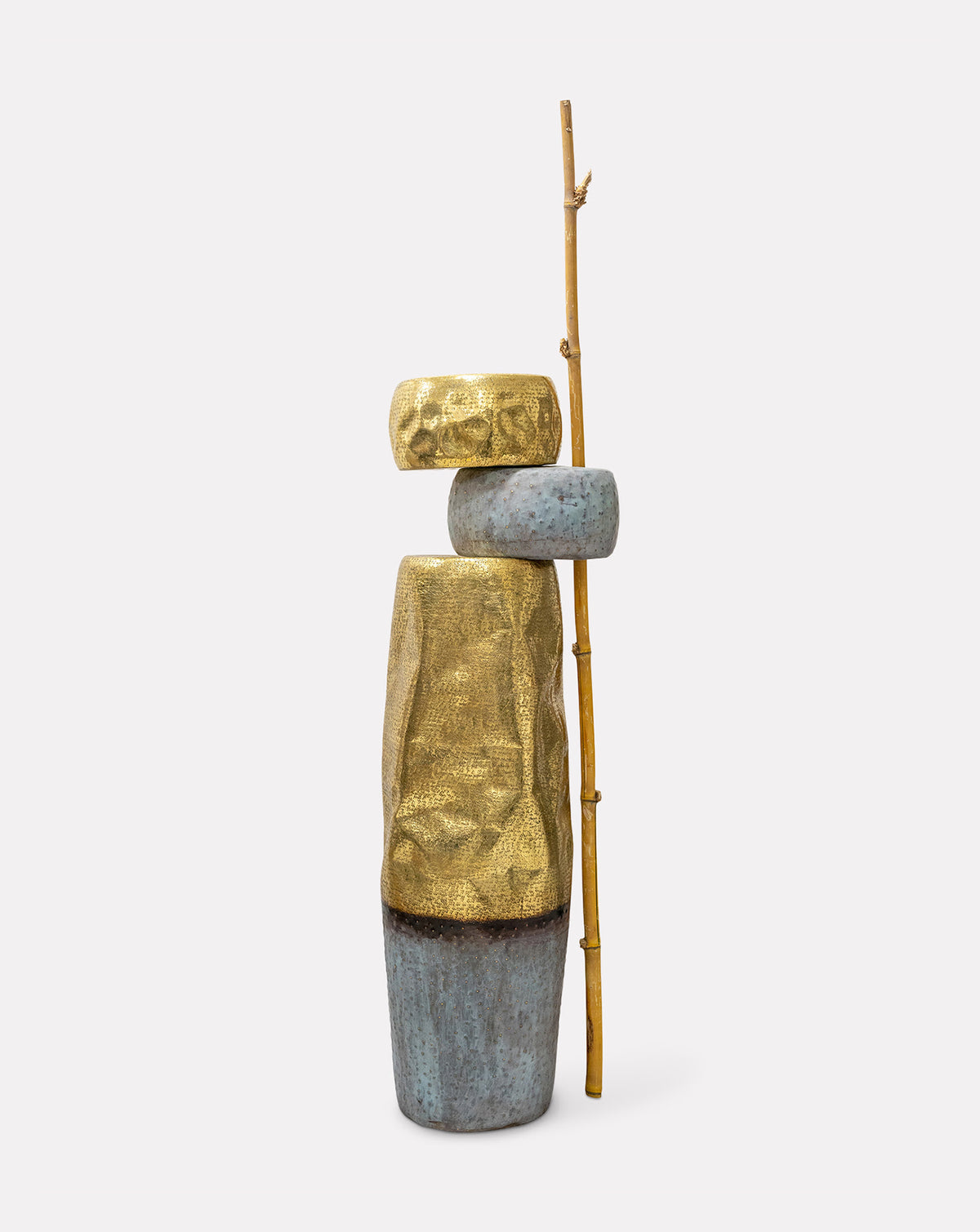 ANAY sculptural floor lamp in brass on patina, textured stacked forms with branch-like detail