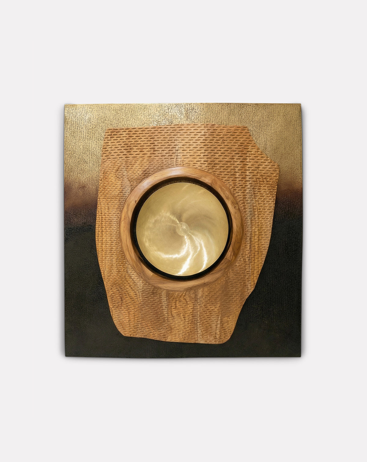 ARINI patinated brass and teak wall art, a sculptural counterpoint to luxury kitchenware in open-plan rooms