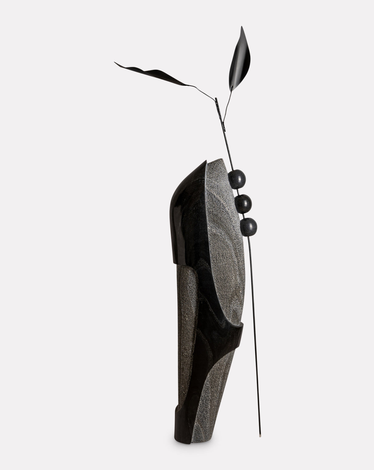 ARITIRA sculptural floor lamp hand-carved from solid marble in a minimal contemporary silhouette