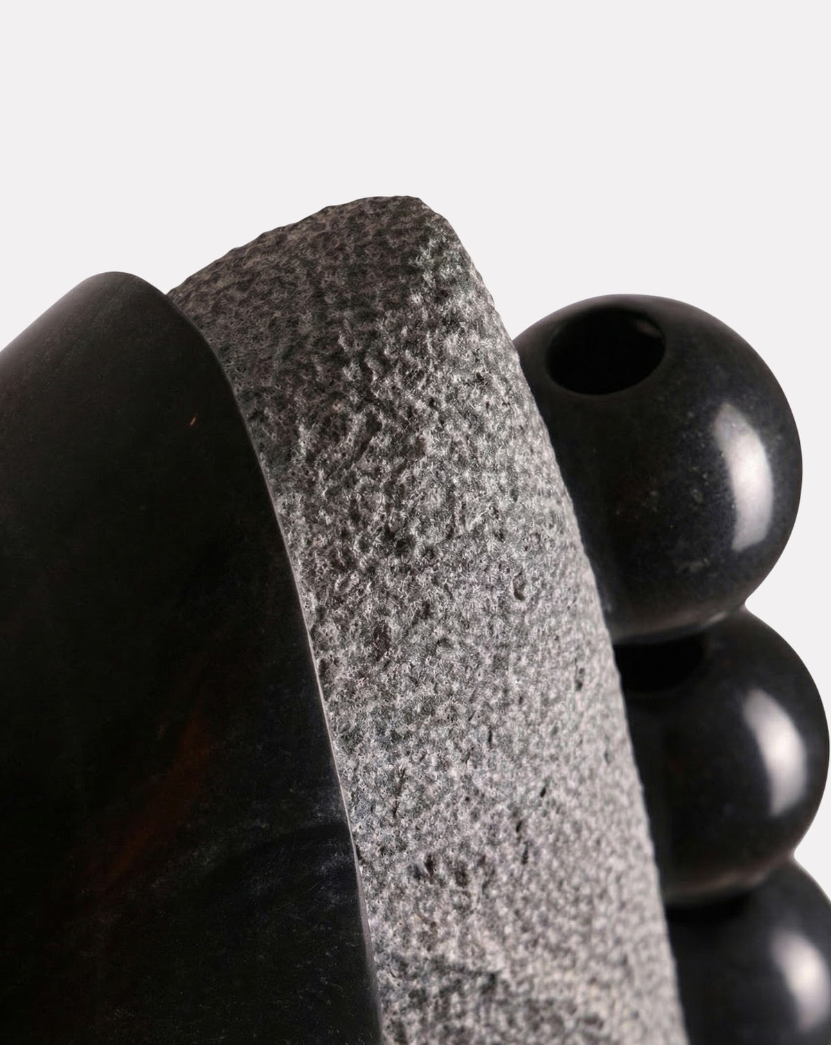 Hand-carved marble profile viewed from the side, 19 cm deep and slender