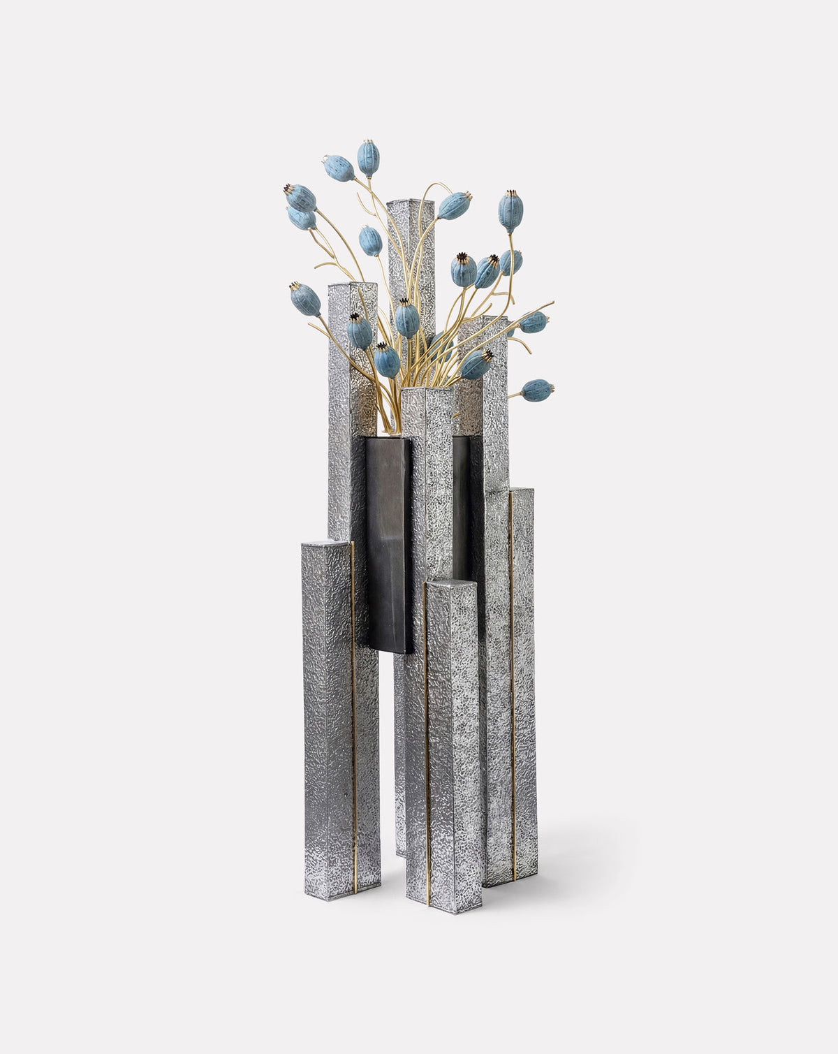 ARIYETH aluminium and brass floor sculpture, a collectible statement for homes styled with luxury kitchenware and design