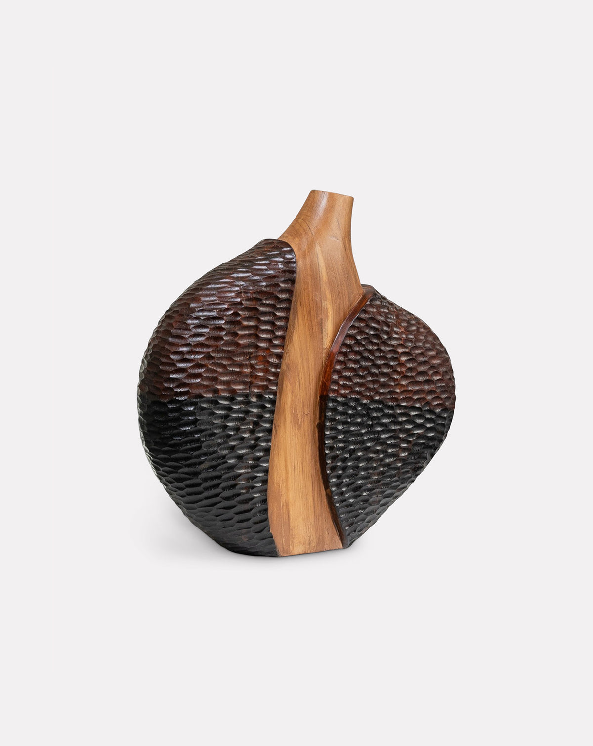 Sculptural vessel styled as a standalone statement on an entryway table