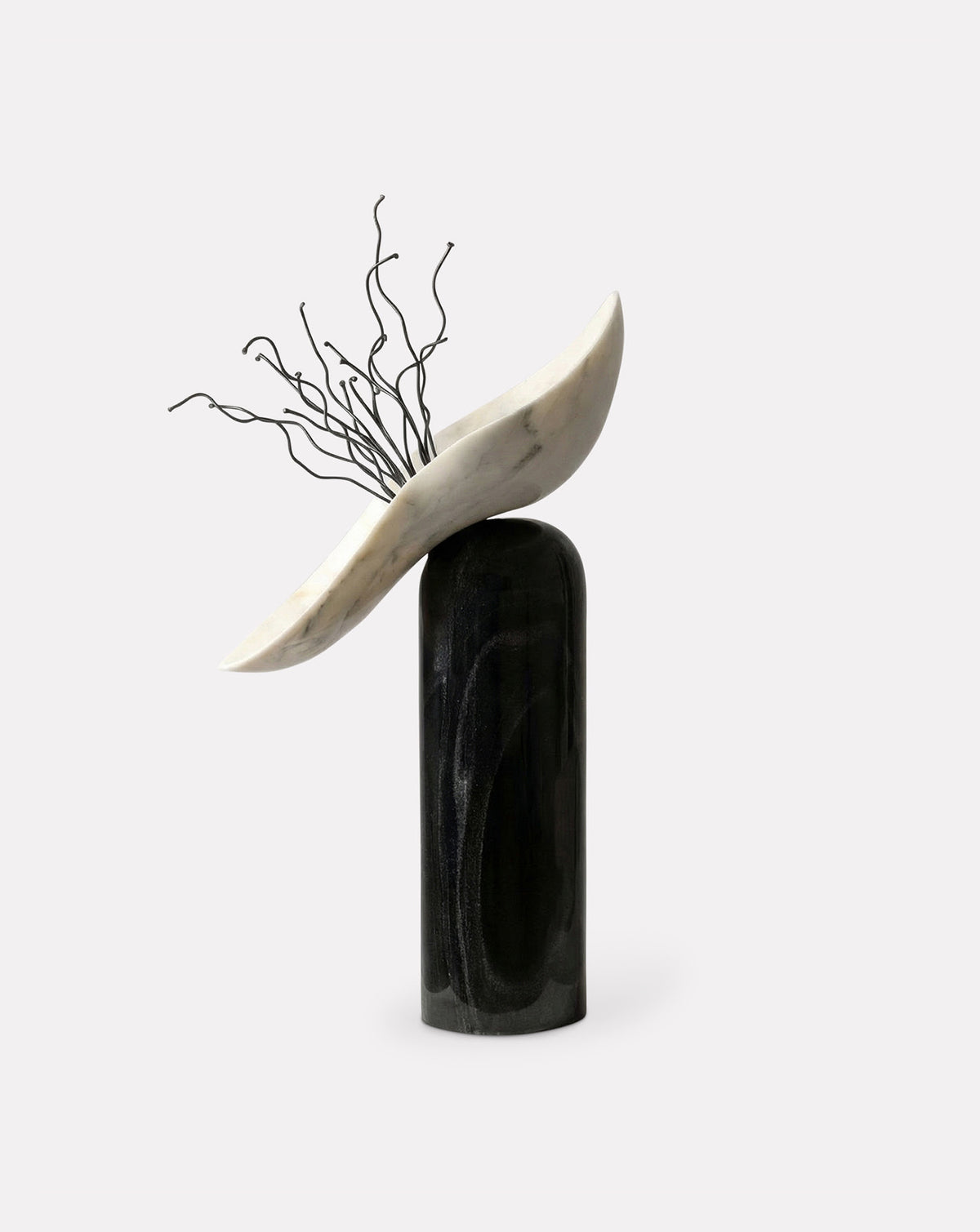 MAHA 03 black and white marble floor sculpture, a statement counterpoint to luxury kitchenware in open-plan living