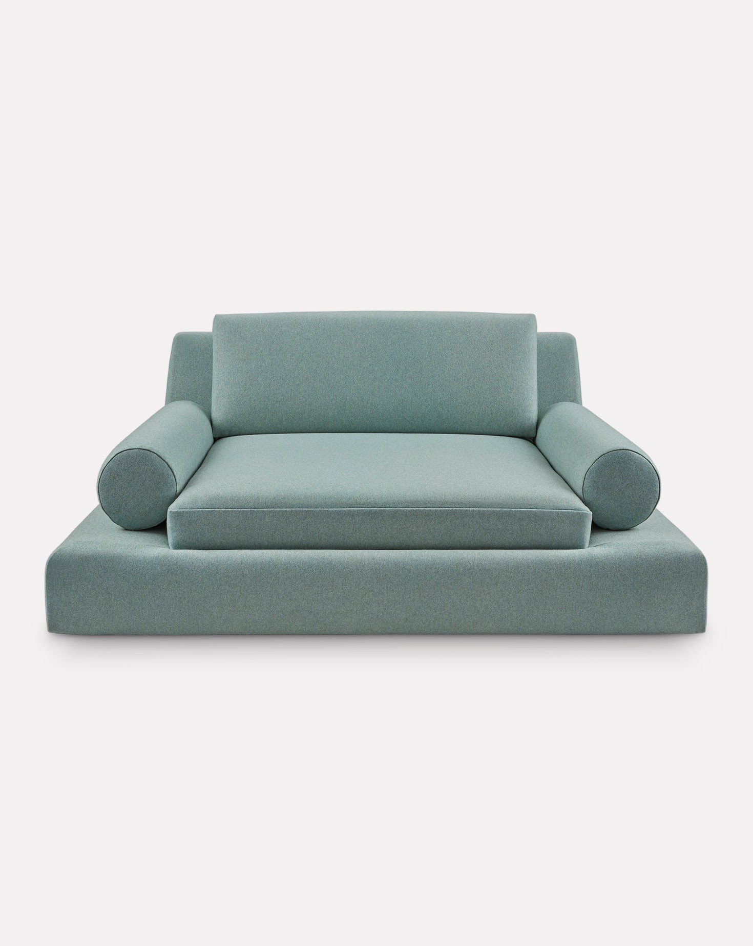 Modern light blue sofa on a white background