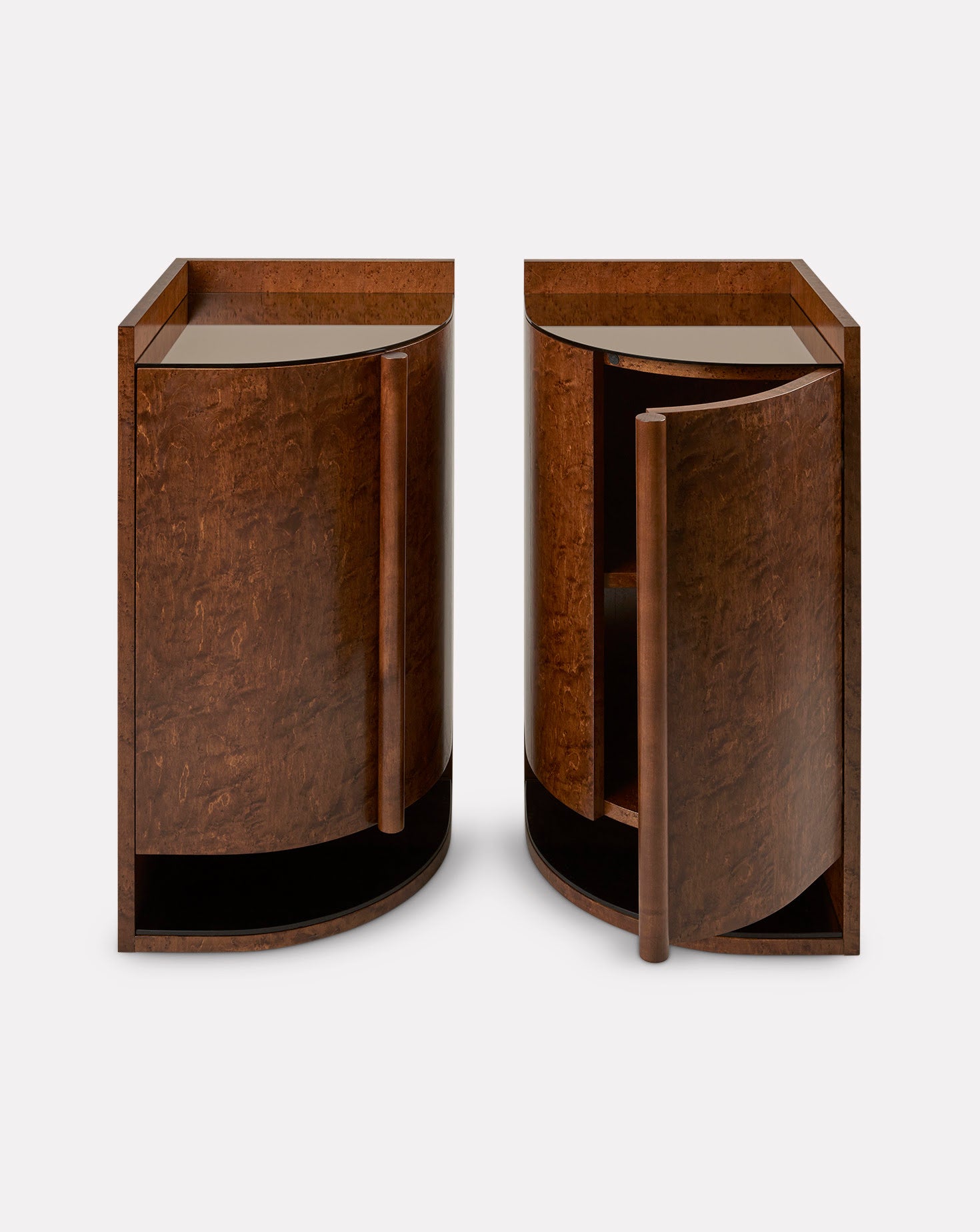 Pair of wooden side tables with open doors on a white background